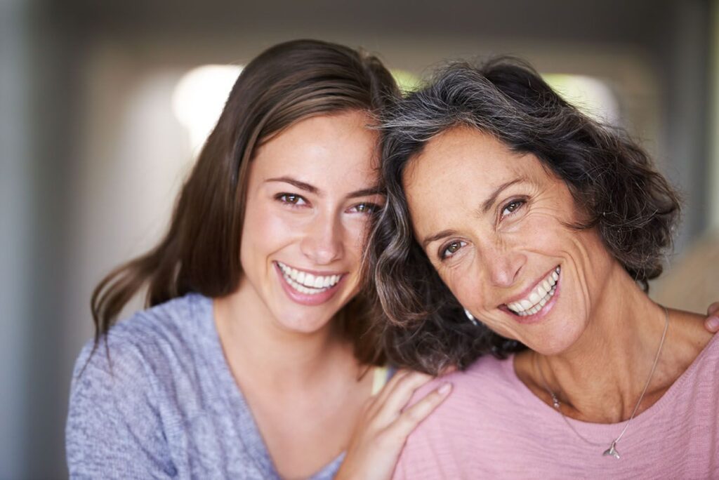 happy smiling dental patients with healthy teeth